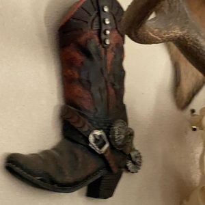 Syroco lightweight hanging cowboy boot decor it is measured at 16”tall 12”wide